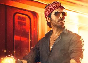 'Shehzada' Kartik Aaryan in a whole new action avatar in the latest poster