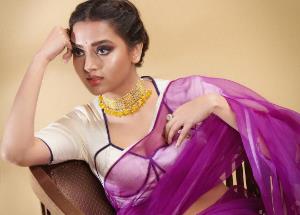 Tejasswi Prakash glows in purple saree and white blouse