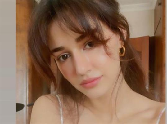 Disha Patani sets the temperature high in this silver shimmery dress; CHECK OUT