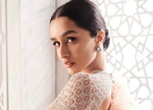 Shraddha Kapoor looks stunning in a feathery sequined gown