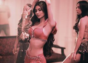 Mouni Roy looks gorgeous as ever as she dons custom made outfits for her latest single Fakeeran